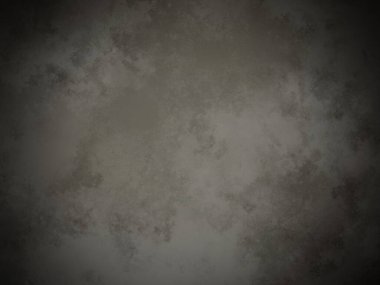 Koyu gri bir arkaplan ve pürüzlü bir doku