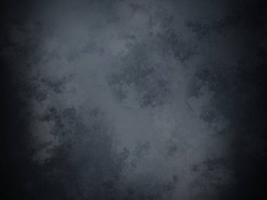 desenli yüzeyi olan koyu bir arkaplan