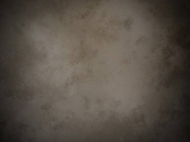 Koyu kahverengi bir duvar ve beyaz bir nokta.