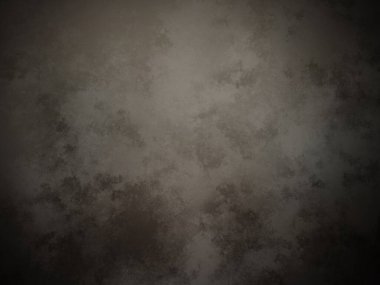 Koyu kahverengi bir duvar ve beyaz bir nokta.