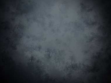 desenli yüzeyi olan koyu bir arkaplan