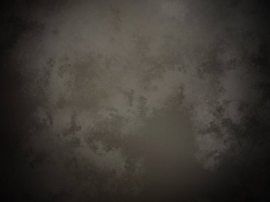 desenli yüzeyi olan koyu bir arkaplan