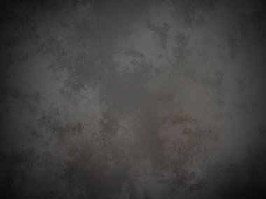 Solmuş yüzeyi olan koyu gri bir duvar.