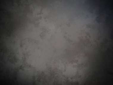 Bir duvarın siyah beyaz fotoğrafı.