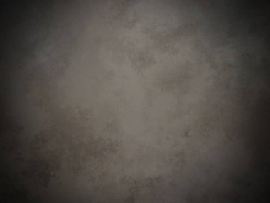 Koyu gri bir duvar ve beyaz bir nokta.