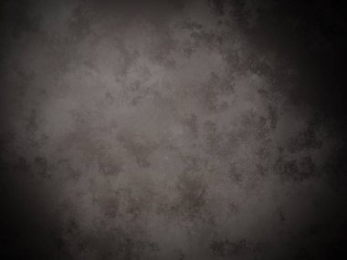 Koyu gri bir duvar ve beyaz bir nokta.