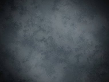 Koyu gri bir arkaplan ve soluk bir doku.