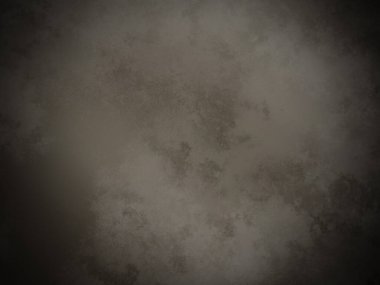 Bir duvarın siyah beyaz fotoğrafı.