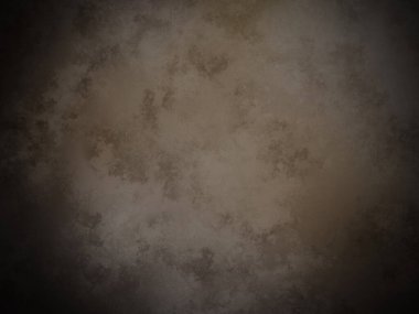 soluk yüzeyi olan koyu kahverengi bir arkaplan.