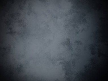 Koyu gri bir arkaplan ve soluk bir doku.