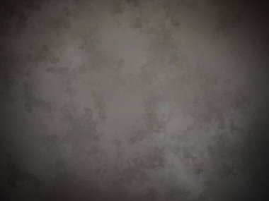 Koyu gri bir duvar ve beyaz bir nokta.