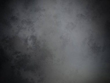 Bir duvarın siyah beyaz fotoğrafı.