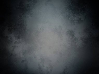 Ortasında ışık olan koyu bir arkaplan.