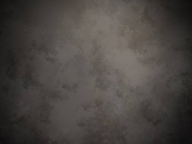 Koyu gri bir duvar ve kirli bir dokusu var.