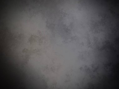 Bir duvarın siyah beyaz fotoğrafı.