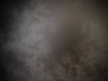 Bir duvarın siyah beyaz fotoğrafı.