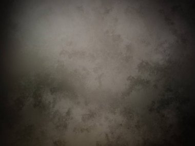 Bir duvarın siyah beyaz fotoğrafı.