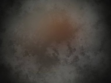 Siyah arkaplanın ortasında kahverengi bir nokta