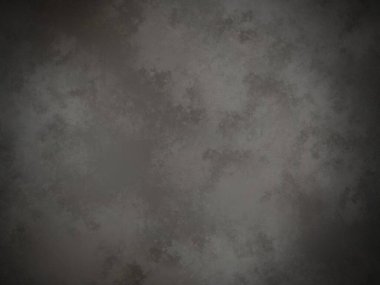 Koyu gri bir arkaplan ve pürüzlü bir doku