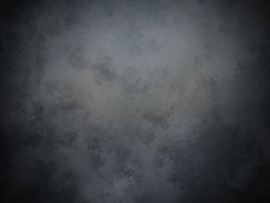 Koyu gri bir arkaplan ve soluk bir doku.