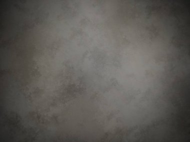 Koyu gri bir duvar ve beyaz bir nokta.