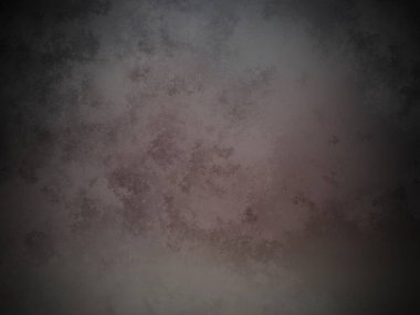 Üzerinde saat olan karanlık ve kirli bir duvar.