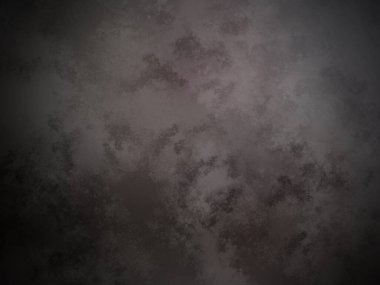 Koyu bir arka plan ve bir boya dokusu.