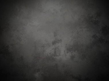 Bir duvarın siyah beyaz fotoğrafı.