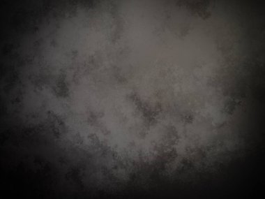 Bir duvarın siyah beyaz fotoğrafı.