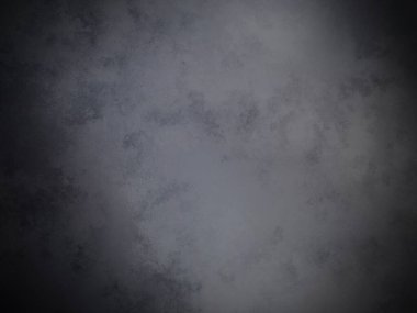 Bir duvarın siyah beyaz fotoğrafı.