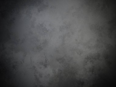 Bir duvarın siyah beyaz fotoğrafı.