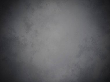 Bir duvarın siyah beyaz fotoğrafı.