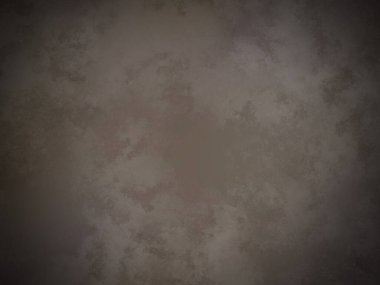 soluk yüzeyi olan koyu kahverengi bir arkaplan.