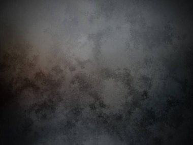 Bir duvarın siyah beyaz fotoğrafı.