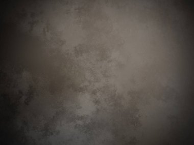 Tepesinde beyaz bir leke olan siyah bir duvar.