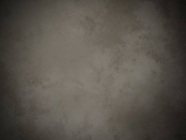 Koyu gri bir duvar ve beyaz bir nokta.