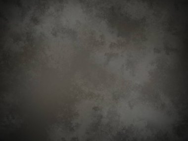 Koyu gri bir arkaplan ve pürüzlü bir doku