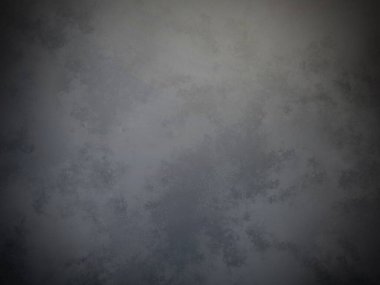 Bir duvarın siyah beyaz fotoğrafı.