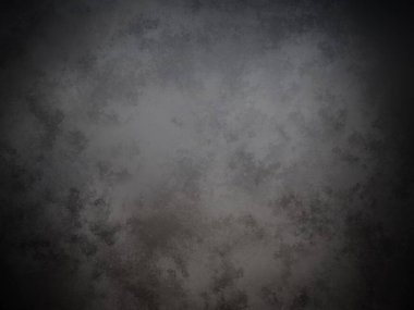 Koyu gri bir arkaplan ve soluk bir doku.