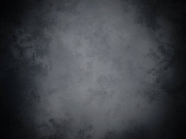 Koyu gri bir arkaplan ve pürüzlü bir doku