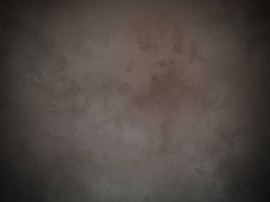 Koyu kahverengi bir duvar ve beyaz bir nokta.