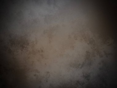 Koyu kahverengi bir duvar ve beyaz bir nokta.