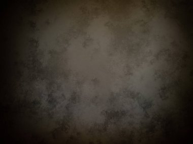 soluk yüzeyi olan koyu kahverengi bir arkaplan.