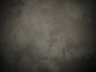 Koyu gri bir duvar ve kirli bir dokusu var.
