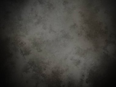 Koyu gri bir arkaplan ve pürüzlü bir doku