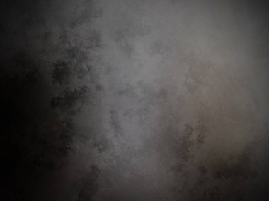 Bir duvarın siyah beyaz fotoğrafı.