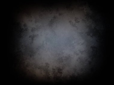 Ortasında ışık olan koyu bir arkaplan.