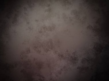 desenli yüzeyi olan koyu bir arkaplan