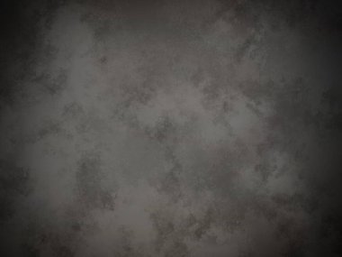 Koyu gri bir duvar ve kirli bir dokusu var.
