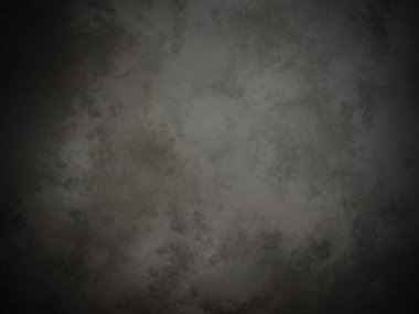 Koyu gri bir duvar ve beyaz bir nokta.